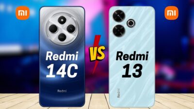 Comparativa visual de dos teléfonos Redmi colocados sobre una mesa de madera con fondo difuminado y logos naranja de Xiaomi en las esquinas: a la izquierda un modelo azul oscuro con un gran módulo circular de cámaras y el texto 'Redmi 14C', a la derecha un modelo celeste con dos lentes prominentes y el texto 'Redmi 13' junto a un rótulo central 'VS', que invita a evaluar Ventajas y desventajas del Xiaomi Redmi 13C: ¿vale la pena?