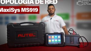 Persona con camiseta blanca de pie junto a un maletín negro con el logo AUTEL en rojo, una tableta diagnóstica encendida que muestra iconos de aplicaciones y una unidad de diagnóstico con pinzas rojas sobre una mesa, imagen adecuada como portada para artículos sobre redes y herramientas de diagnóstico que explique Qué es la topología de red FDDI: ventajas y desventajas esenciales.